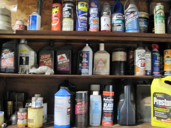 Three Shelves full of Misc Car Liquids