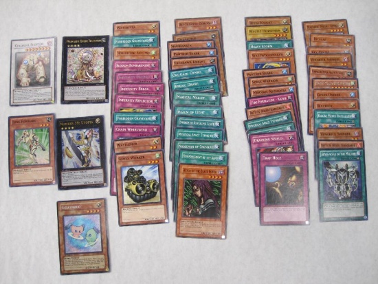 Assorted Yu-Gi-Oh Trading Cards including 1st edition foil Colossal Fighter, foil Madolche Queen