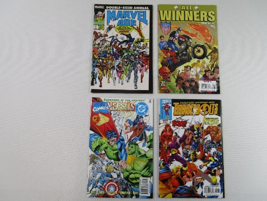 Four Comic Books Including Marvel Age Issue #1, Marvel Versus DC #3, All Winners #1, Thunderbolts