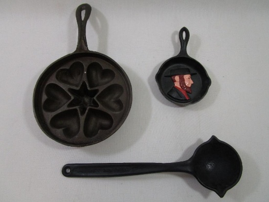 Three Cast Iron Pieces Includes A.L. Sweet Iron Works Ladle, 7.5 inch Mold Pan and Decorative 4.5