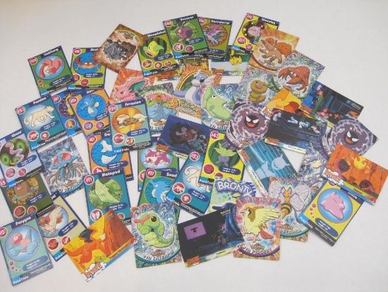 Assorted Topps Pokemon Cards and PokeTrivia Cards, see pictures for condition, 4 oz