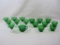Seven Green Glass Cordial Glasses and Nine Tea Cups