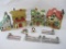 Four Ceramic Winter/Christmas Themed Houses by Decorative Outfit, includes figurines and fencing,
