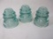 Three Whitall-Tatum Company No 1 Glass Electrical Insulators