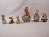 Assortment of Ceramic Figurines Includes Atlantic Mold Caroler, Dutch Girl and others