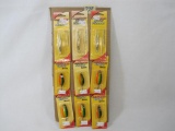 Nine Johnson Fishing Lures, New in Box, Three Silver Minnows, 6 Shutter Spoons