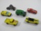 Six Diecast Vehicles by Matchbox and Hot Wheels, Including a Porsche, a Van, a Big Rig and More,