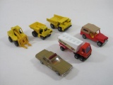 Six Diecast Vehicles by Matchbox . Includes Construction Vehicles, a Tanker and Cars. 12oz
