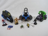 Various DC and Marvel Superhero Themed Toys . Includes Game Pieces by WizKids and Leader in Play,