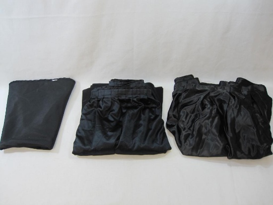 Two Black Table Skirts and One Round 90 inch Cover