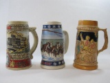 Three Beer Steins Includes Budweiser 1995 Holiday, Lighting the Way Home, Coors 1988 Edition Brewery