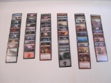 Over 50 Magic the Gathering Cards, reds and blacks, including playset Bogardan Hellkite, Crippling