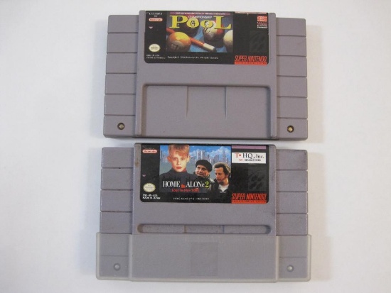 Two Super Nintendo Game Cartridges including Home Alone 2 Lost in New York and Championship Pool,