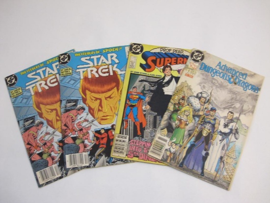 Four DC Comic Books: Advanced Dungeons & Dragons No. 1, Superman 11, and Star Trek No. 45, see