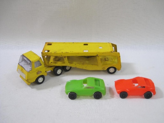 Tonka Metal and Plastic Toy Truck with Car Carrier Trailer and Two Cars, 1 lb