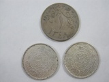 Three Saudi Arabia Coins: 1929 1 Ghirsh and two 1935 1/2 Riyal