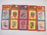 Five Sealed Packages of Licensed Self-Stick Valentine Shapes including Super Mario Bros and Teenage