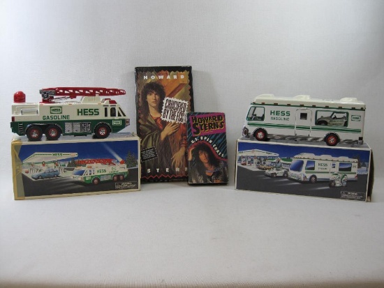 Two Hess Trucks includes Recreation Van, 1998, Emergency Ladder Truck, 1996, Plus Howard Stern U.S.