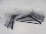 Sixteen New Flocked Hangers, Eight with Pants Hangers, still in original plastic