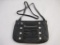 New B Makowsky Black Leather Zip-Top Crossbody Bag with branded storage bag, 11 oz