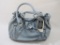 New B Makowsky Light Blue Leather Purse with Branded Storage Bag, 2 lbs 13 oz