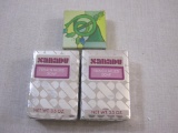 Three Vintage Soaps including Xanadu French Milled Soap and Avon Sounds of Christmas Horn Mini Soap,