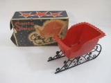 Vintage Red Plastic Santa Sleigh in original box, 7 oz