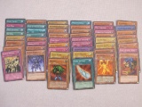 50 Assorted Yu-Gi-Oh Trading Cards including Blade Rabbit, A Wingbeat of Giant Dragon, Wild Tornado