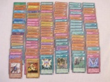 Approximately 100 Yu-Gi-Oh Trading Cards including foil Mask Monster, foil Hungered Hamburgr, and