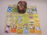 Assorted Pokemon Trading Cards including foil Emolga, Snivy, Minccino, and more with collectible