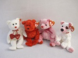 Four Valentine's TY Beanie Babies including Truly, Cupid, Sizzle, and Romance, all with original