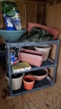 Plastic Shelf with Assorted Potting Materials and Pots
