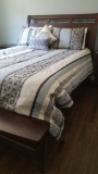 Queen Size Wood Bed with Bench and Two Storage Drawers in the foot, measures 63 inches x 57 x 94