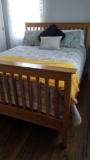 Mission Style Queen Size Oak Bed, 63 in wide x 86 in long x 48 in tall at the headboard, mattress