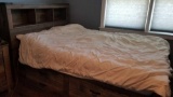 Full Sized Bed with Two Storage Drawers Underneath, 49 in tall at the headboard 86 in Long 60 in