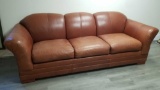 Three Seat Leather Couch, see pictures for wear. Approximately 94 in wide 39 inches deep and 33 in