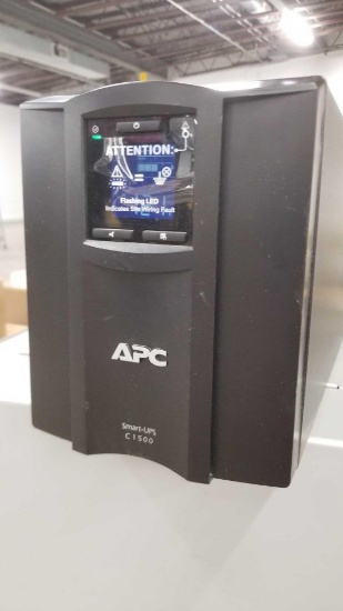 APC Smart UPS C1500, powers on when plugged in