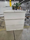 Four Metal Filing Cabinets