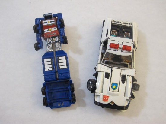 Two 1980s Transformers including Prowl Police Car and Go Bots Road Ranger, 5 oz