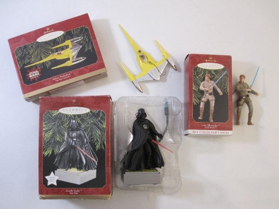 Three Star Wars Hallmark Keepsake Ornaments including Luke Skywalker, Darth Vader, and Naboo
