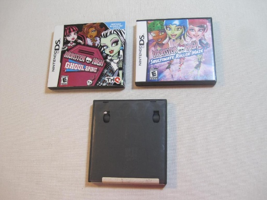 Three Nintendo DS Games includes Two Monster High , Ghoul Spirit, 2011, and Skultimate Roller Maze,
