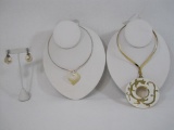 Two Vintage Torque Necklaces and Mother of Pearl Clip on Earrings