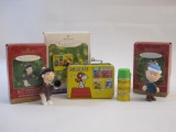 Three Hallmark Peanuts Christmas Ornaments including Charlie Brown, Lucy, and Peanuts Lunch Box Set,