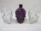 Three Glass Skull Bottles