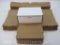 One Dozen Small White Folding Boxes