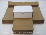 One Dozen Small White Folding Boxes