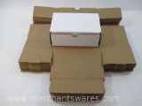 One Dozen Small White Folding Boxes