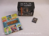 Three Lootcrate Items including The League of Regrettable Superheroes Hardcover Book, Game of