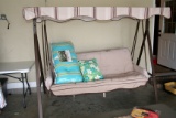 Covered Swing and Extra Pillows