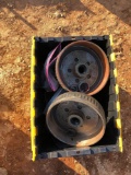 Yellow and black crate with axle parts